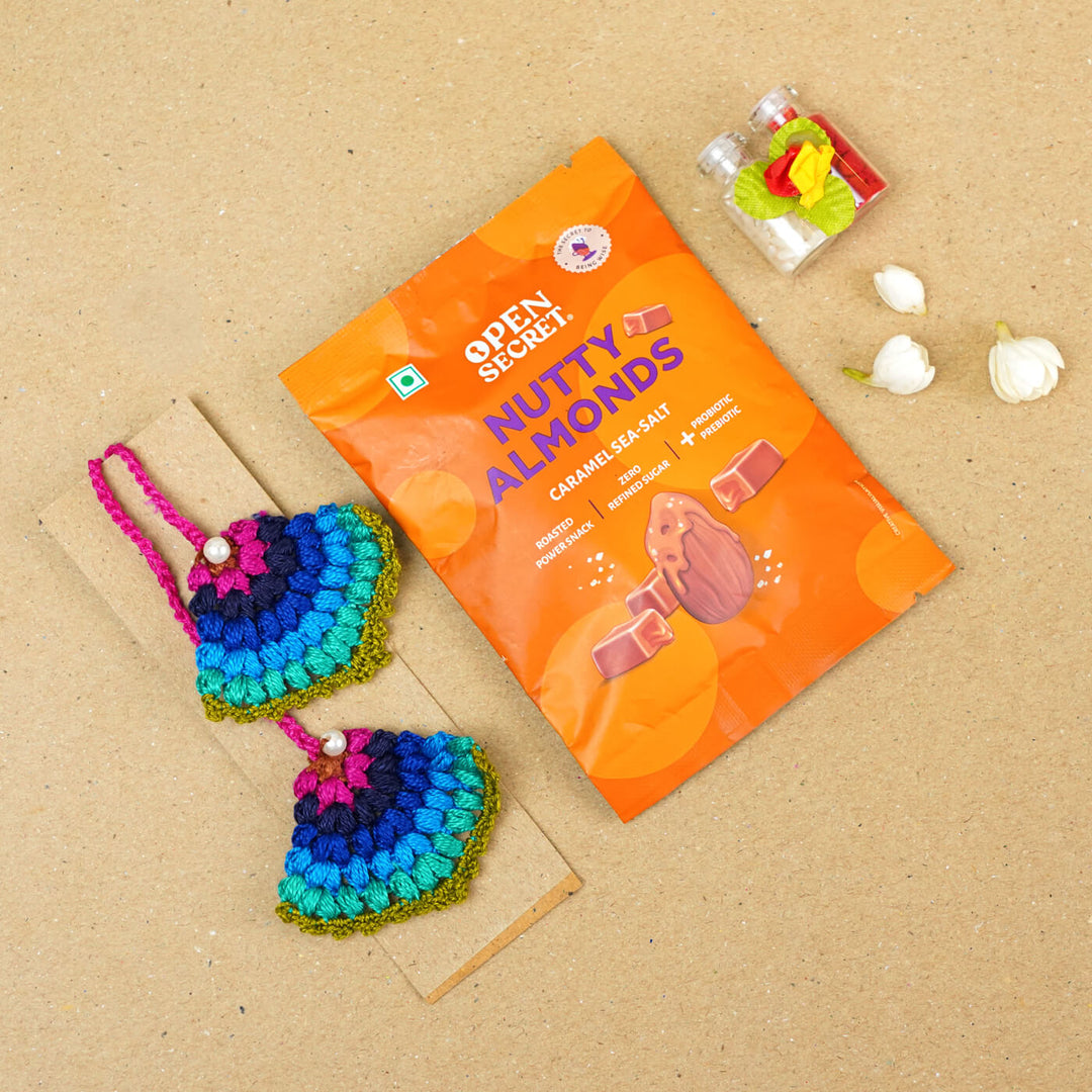 Handmade Crochet Peacock Cotton Lumba Rakhi For Bhabhi With Roli Chawal - Flat lay with product comparison