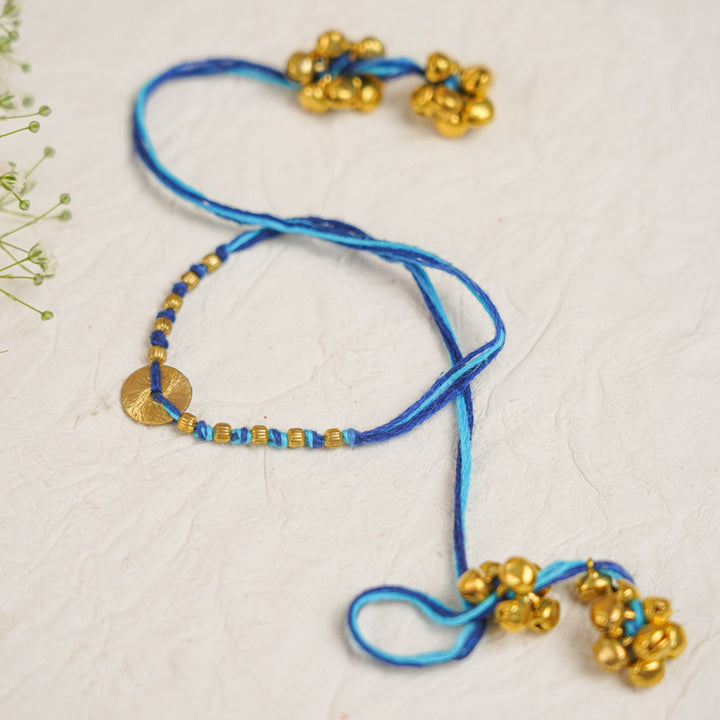 Handmade Swarn Sutra Ghungroo Bhaiya Bhabhi Rakhi With Roli Chawal - Close-up of Bell Cluster and Thread Blue