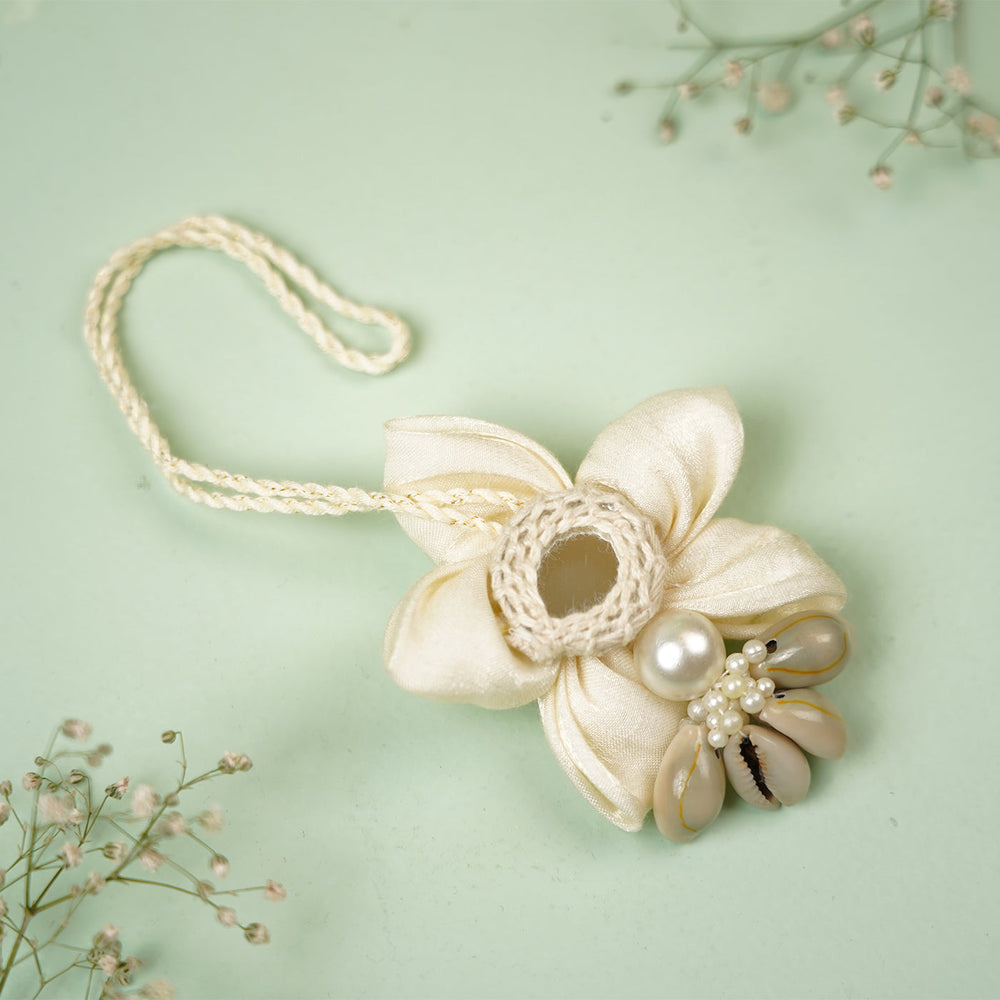 Handmade White Shwet Shell And Mirror Bhaiya Bhabhi Rakhi With Roli Chawal - Lying Flat on Surface