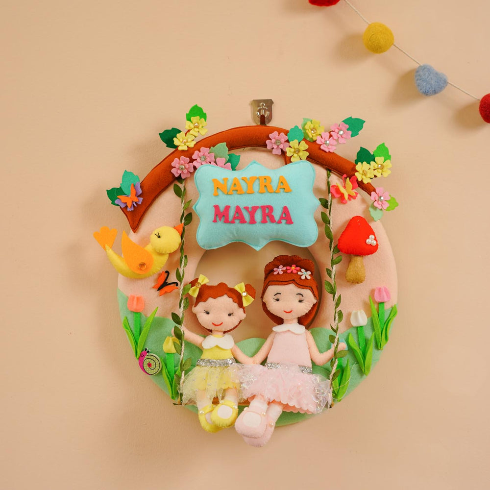 Handcrafted Personalized Spring Theme Felt Nameplate For Siblings - Front View Hanging on Wall