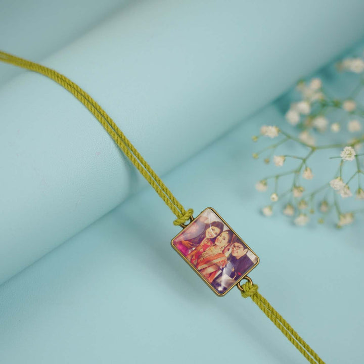 Photo Personalized Handmade Rectangle Antique Bronze Rakhi With Roli Chawal - Close-up Showing Rope Detail