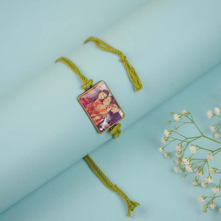 Photo Personalized Handmade Rectangle Antique Bronze Rakhi With Roli Chawal - Close-up of Photo Rakhi