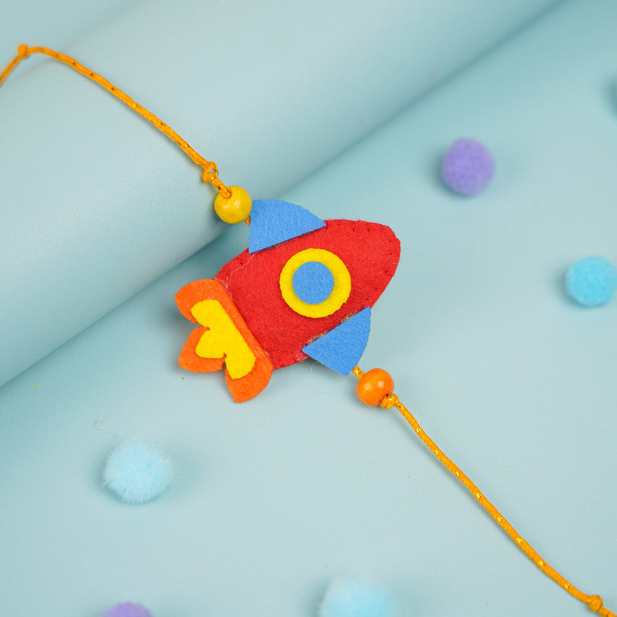 Handmade Beaded Rocket Theme Felt Rakhi With Roli Chawal For Kids - Front View