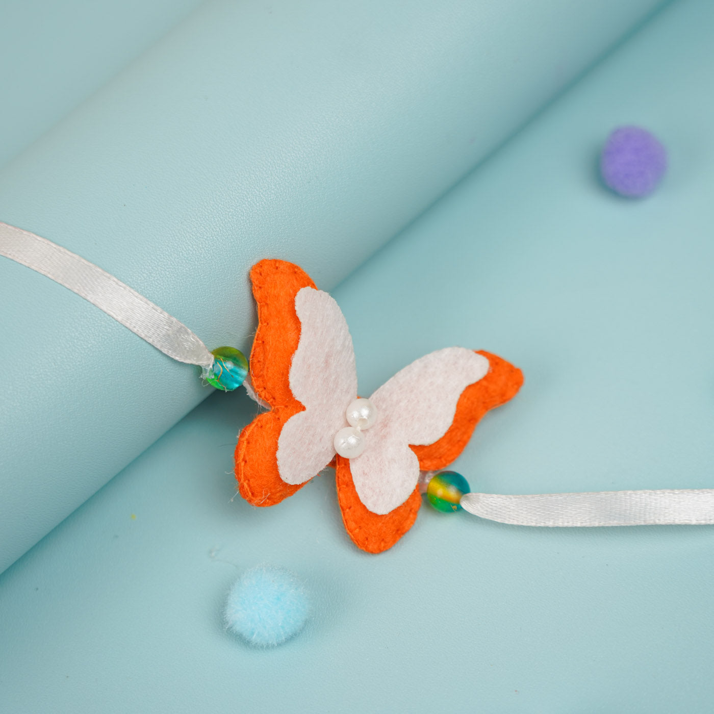 Buy Customized Handmade Butterfly Theme Pom - Pom Felt Rakhi With Roli ...