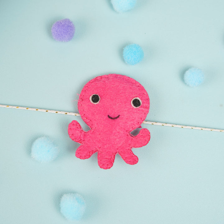 Customized Handmade Beaded Octopus Theme Felt Rakhi With Roli Chawal For Kids - Pink Octopus on String Close-up
