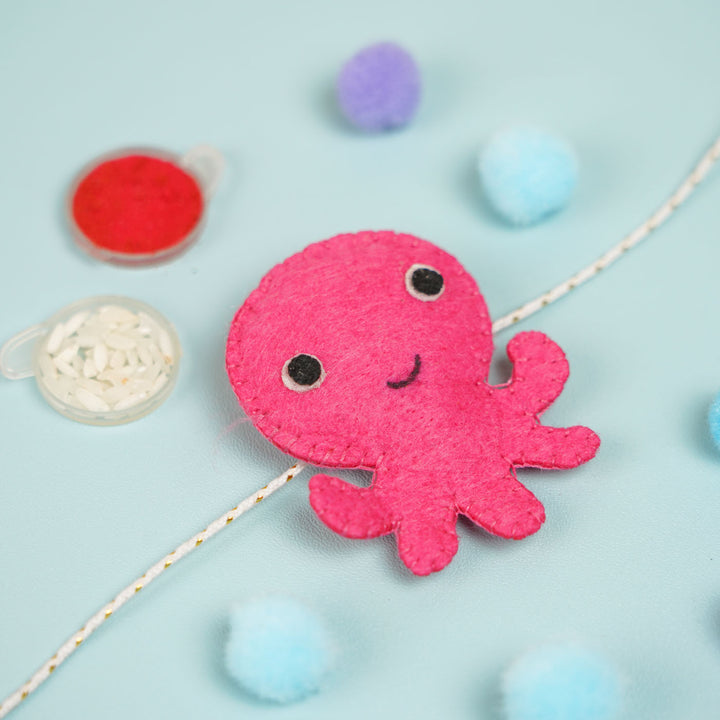 Customized Handmade Beaded Octopus Theme Felt Rakhi With Roli Chawal For Kids - Pink Octopus Close-up with Paint