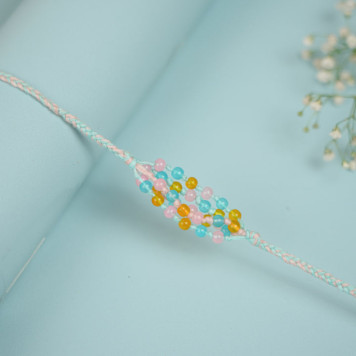 Handmade Beaded Megh Malhar Rakhi With Roli Chawal - Close-up of Beaded Bracelet Detail