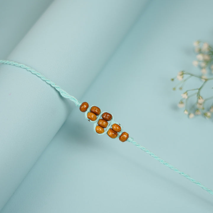 Handmade Beaded Minimalist Rakhi With Roli Chawal - Close-up of single bracelet bead