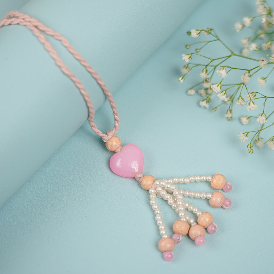 Handmade Beaded Pink Heart Prem Gulika Lumba Rakhi For Bhabhi With Roli Chawal - Close-up of Heart Pendant Necklace