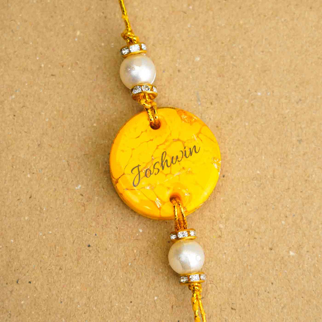 Personalized Handmade Yellow Resin Rakhi With Roli Chawal