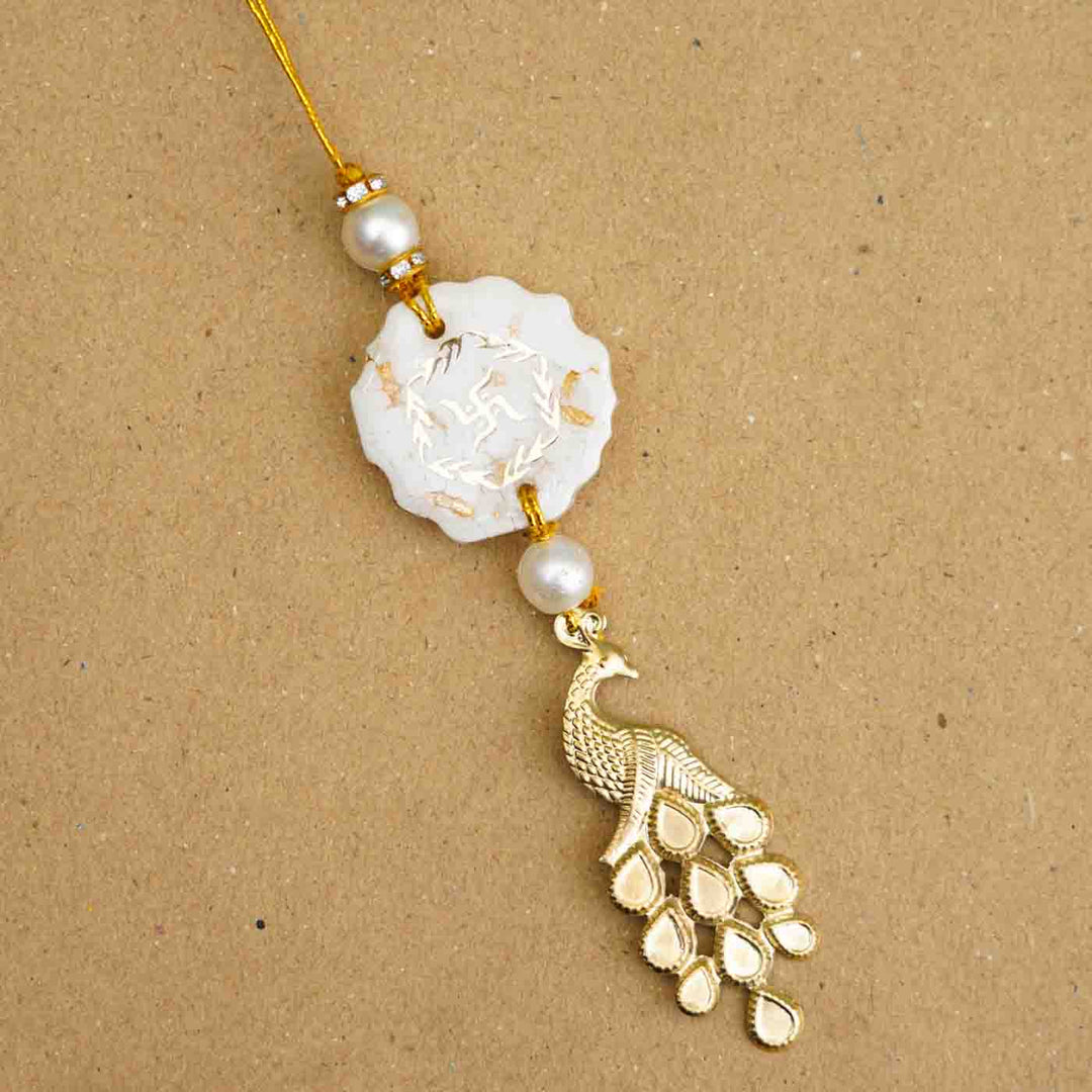Personalized Handmade White Resin Lumba Rakhi For Bhabhi With Roli Chawal - Close-up Detail View