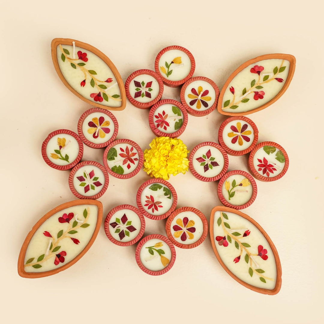 Set of 20 | Soy Wax & Dry Flower Terracota Festive Diyas | 4 Boat Diyas + 16 Round Diyas