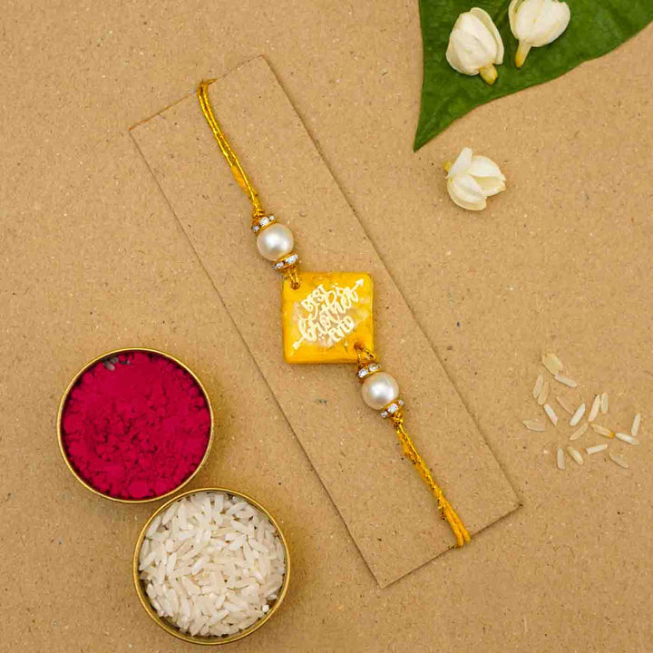 Personalized Handmade Yellow Resin Rakhi With Roli Chawal