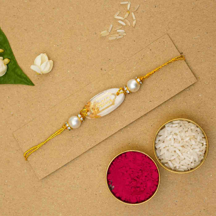Personalized Handmade White Resin Rakhi With Roli Chawal