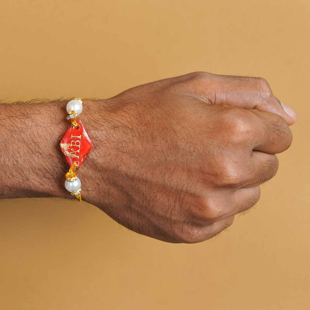 Personalized Handmade Red Resin Rakhi With Roli Chawal