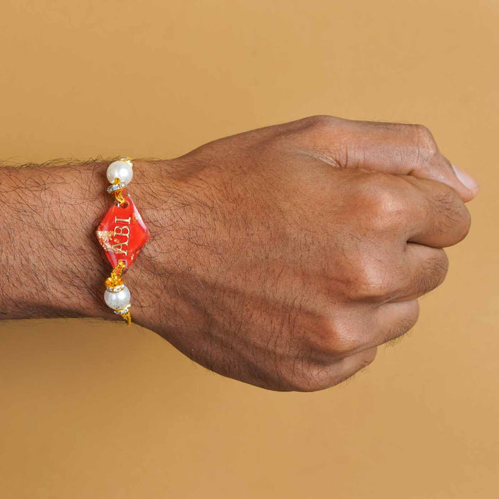 Personalized Handmade Red Resin Rakhi With Roli Chawal