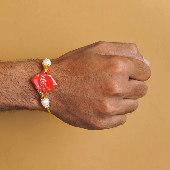 Personalized Handmade Red Resin Rakhi With Roli Chawal