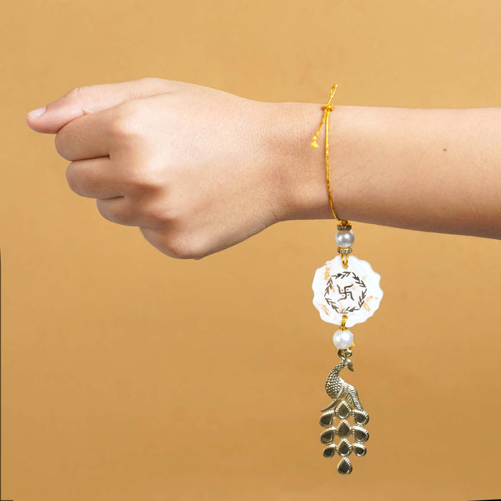 Personalized Handmade White Resin Lumba Rakhi For Bhabhi With Roli Chawal - Worn on Wrist Display