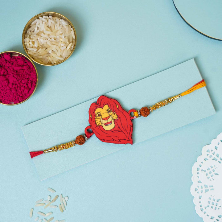Handmade Printed Lion King Wooden Rudraksha Rakhi With Roli Chawal