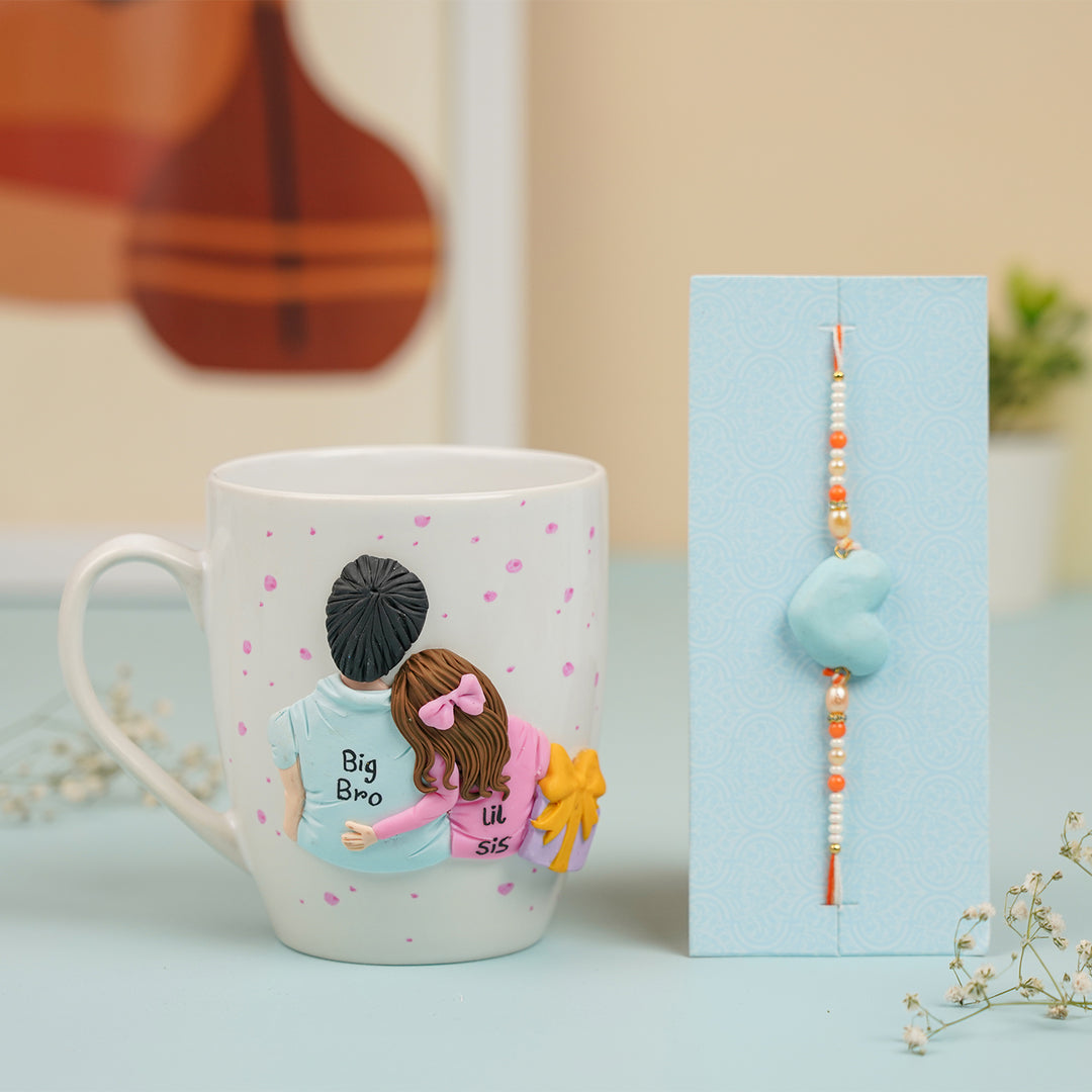 Handmade Big Bro And Lil Sis Clay Rakhi Hamper With Roli Chawal Includes 1 Mug 1 Rakhi - Mug and Bracelet Display