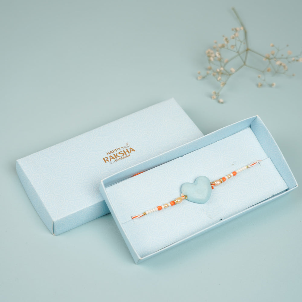 Handmade Big Bro And Lil Sis Clay Rakhi Hamper With Roli Chawal Includes 1 Mug 1 Rakhi - Bracelet in Gift Box