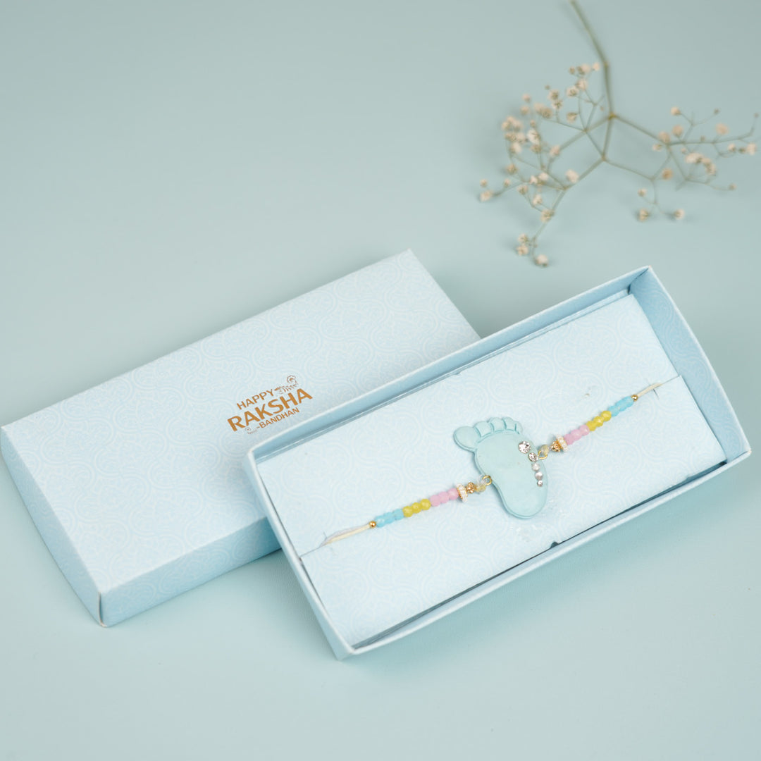 Handmade Blue And Pink Baby Feet Clay Bhaiya Bhabhi Rakhi With Roli Chawal Set Of 2 - In Packaging Box
