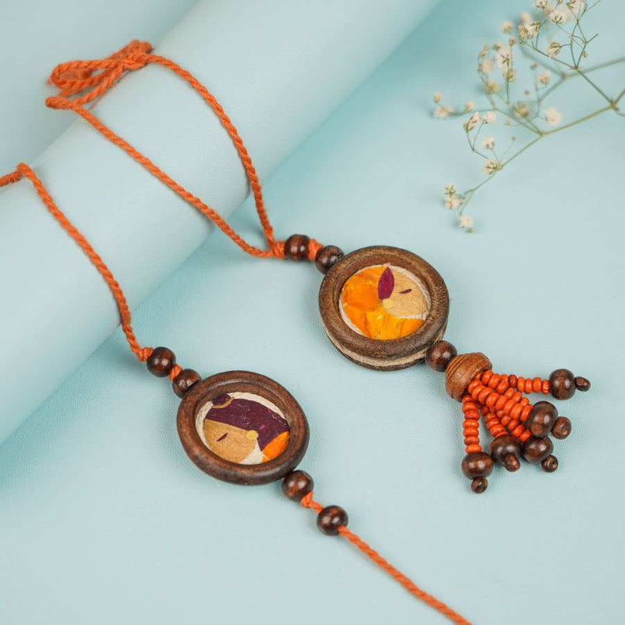 Handmade Pressed Flower Art Kesari Beaded Wooden Bhaiya Bhabhi Rakhi With Roli Chawal - Top View of Both Bracelets