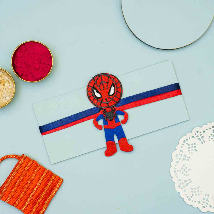 Personalized Handmade Spiderman Theme Felt Kids Rakhi And Photo Frame Combo For Brother Set Of 2 - Flat Lay with Envelope Decoration