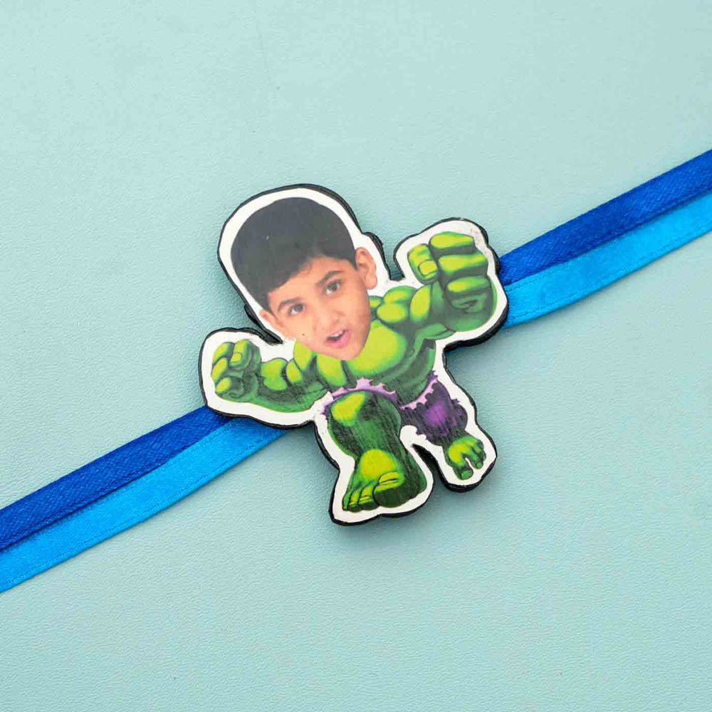 Photo Personalized Reusable X Large Hulk Mdf Wood Rakhi With Chocolates And Roli Chawal - Close-up of Character on Ribbon