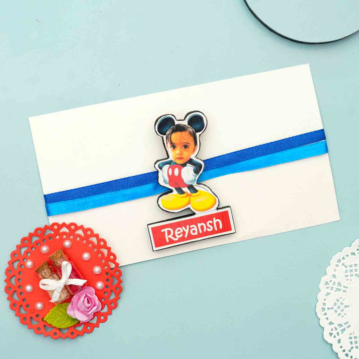 Photo Personalized Reusable X Large Micky Mouse Mdf Wood Rakhi With Chocolates And Roli Chawal - Mounted on Greeting Card