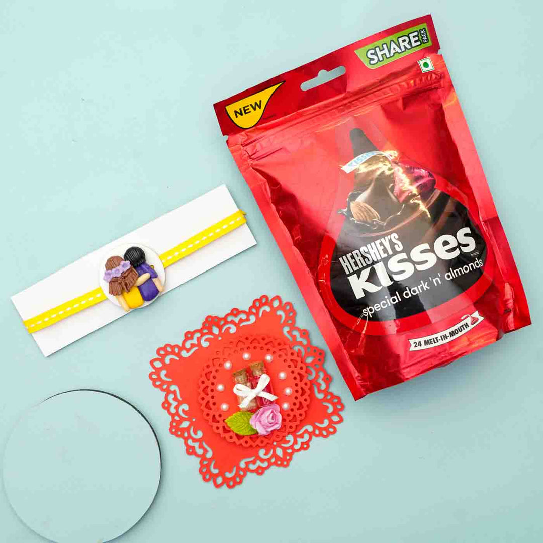 Reusable Miniature Clay X Large Rakhi With Roli Chawal - Flat Lay Including Product Packaging