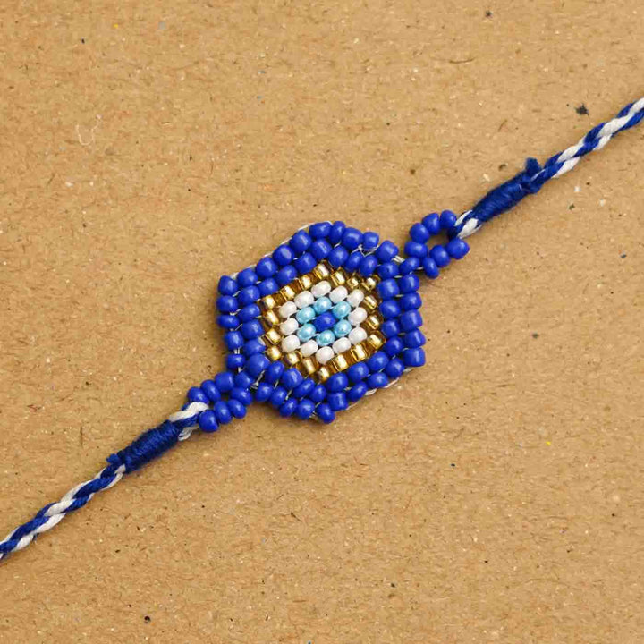 Handmade Beaded Protector Rakhi  With Roli Chawal