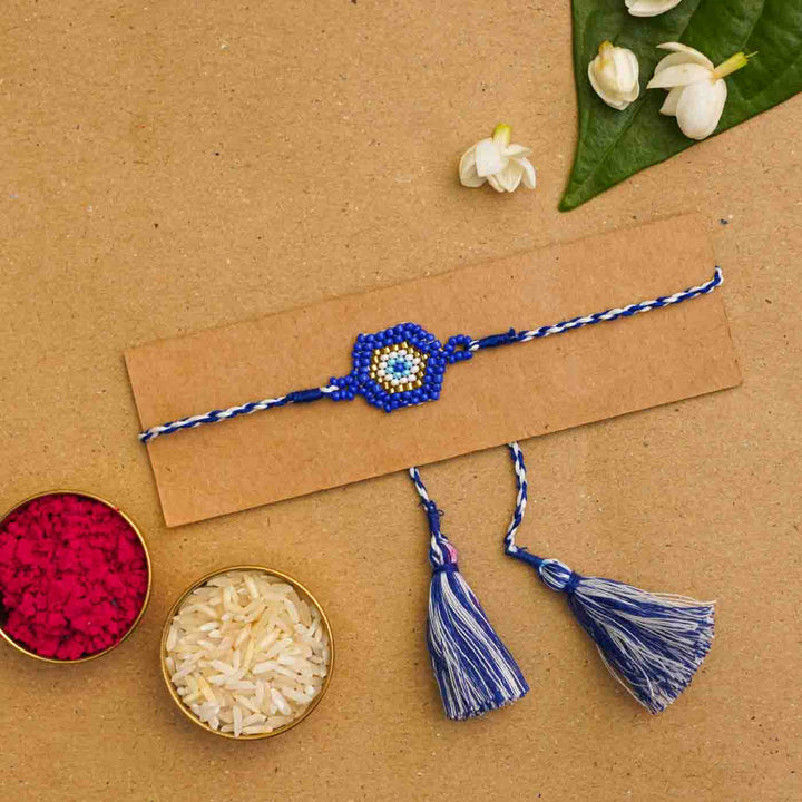 Handmade Beaded Protector Rakhi  With Roli Chawal