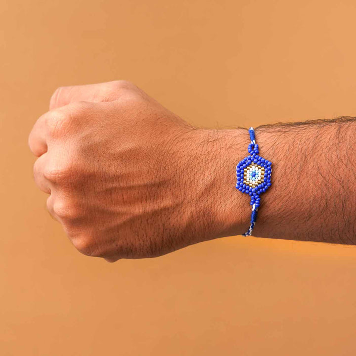Handmade Beaded Protector Rakhi  With Roli Chawal