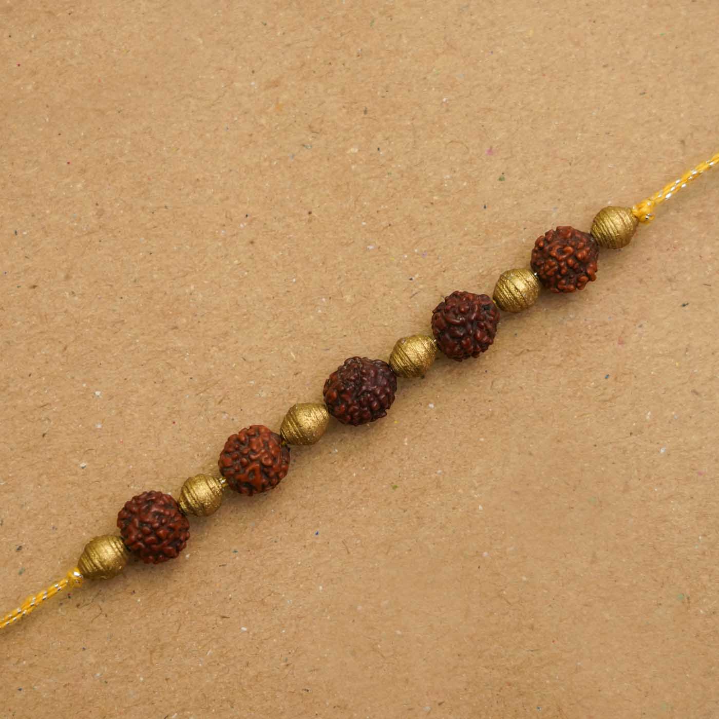 Buy Handmade Ecofriendly Rudraksh Recycled Paper Rakhi With Roli Chawal ...