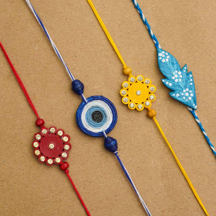 Handmade Ecofriendly Red Quilled Recycled Paper Bhaiya Bhabhi Rakhi With Roli Chawal