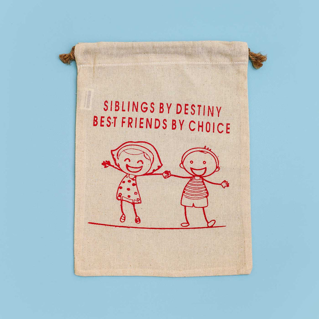 Eco Friendly Fabric Painting Diy Rakhi Hamper With Rice Roli 4 - Front View of Sibling Cotton Potli Bag