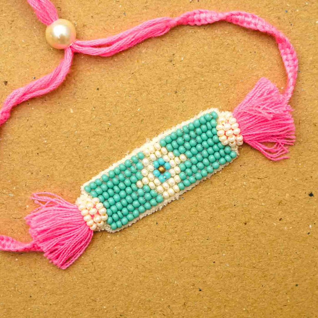 Reusable Beaded Evil Eye Lumba Rakhi For Bhabhi With Roli Chawal - Close-up of beadwork bracelet