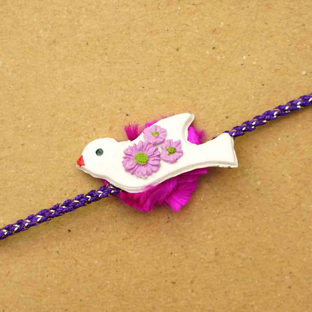 Handmade Bird Clay Rakhi With Chocolates & Roli Chawal