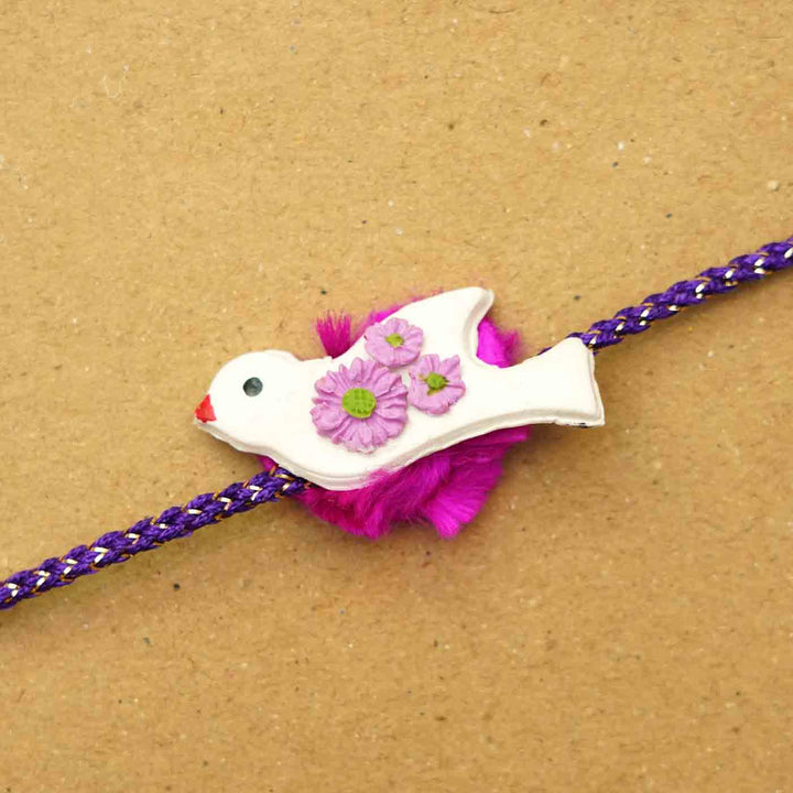 Handmade Bird Clay Rakhi With Chocolates & Roli Chawal