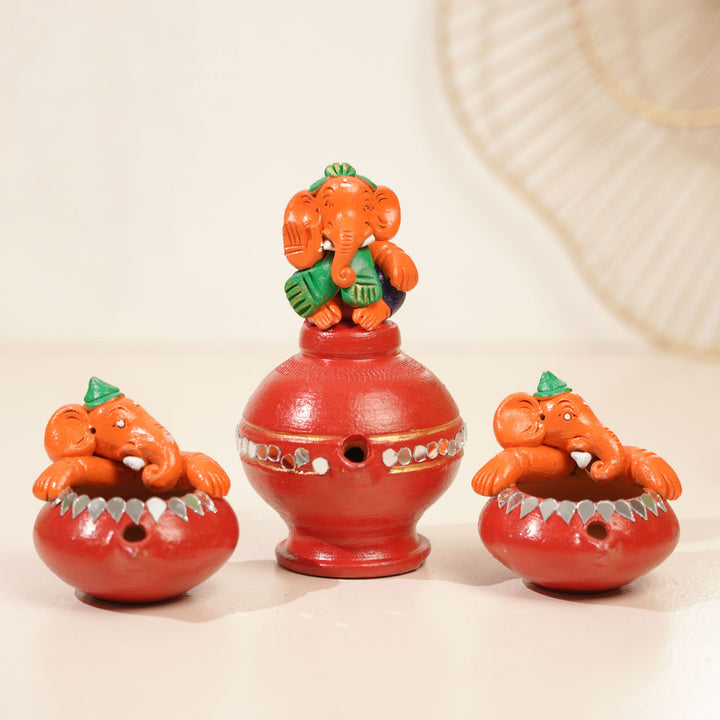 Handmade Painted Ganesh Design Terracotta Oil Lamp / Diya | Includes 1 Magic Diya And 2 Diyas