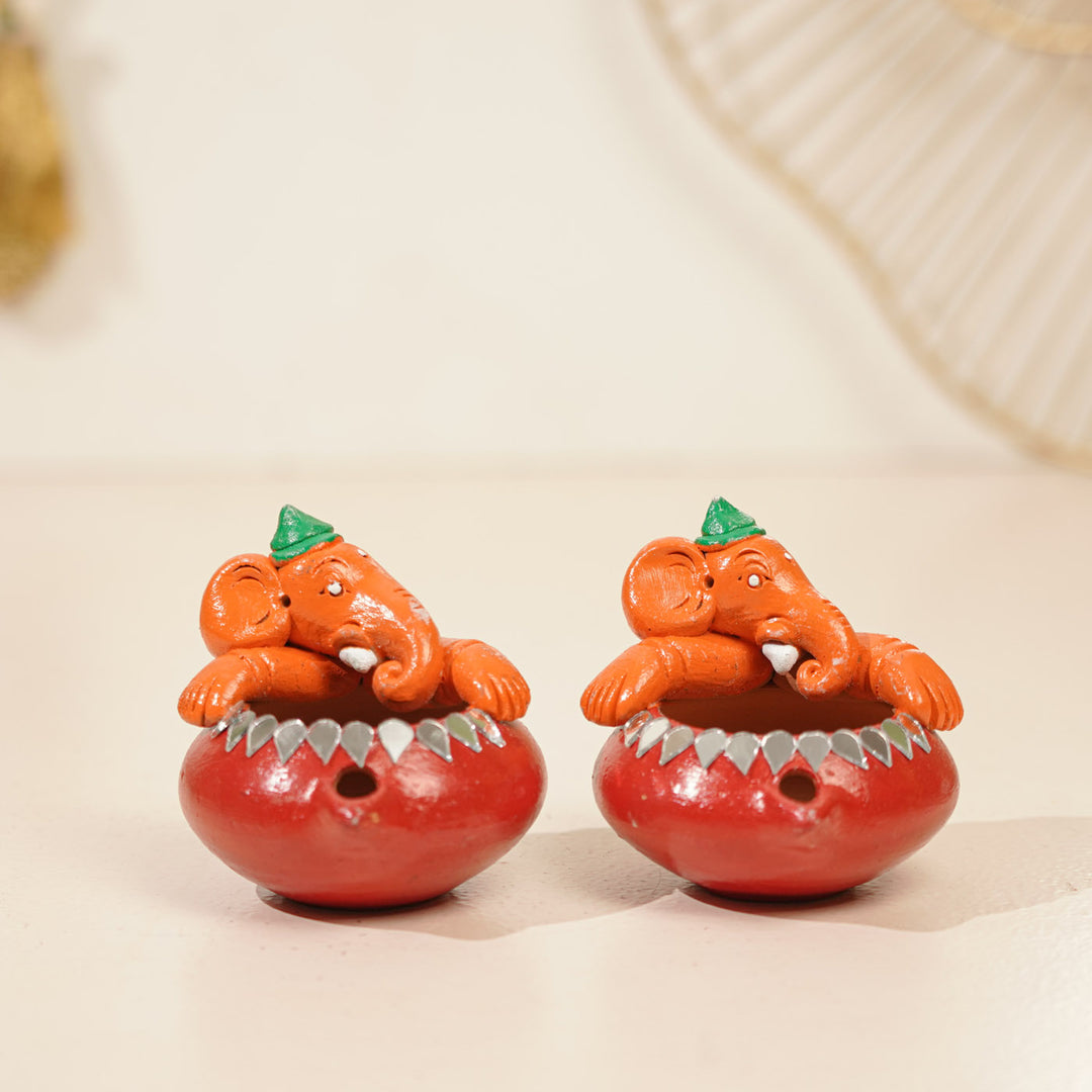 Handmade Painted Ganesh Design Terracotta Oil Lamp / Diya | Includes 1 Magic Diya And 2 Diyas