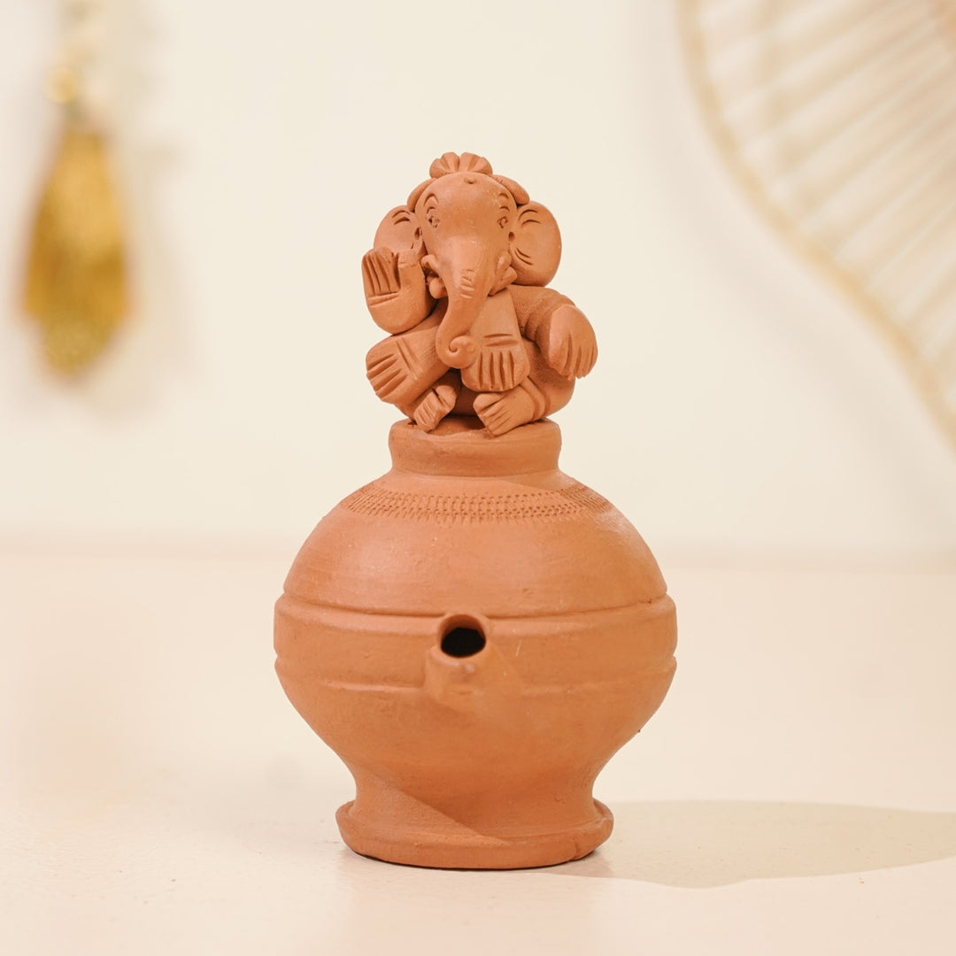 Handmade Ganesh Design Terracotta Oil Lamp / Diya | Includes 1 Magic Diya And 2 Diyas
