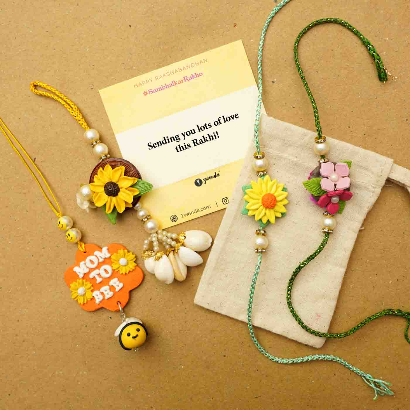 Elegant Divine Lovely Rakhi Set For Brother & Bhabhi - 2 Rakhis With Roli & Chawal, Handcrafted