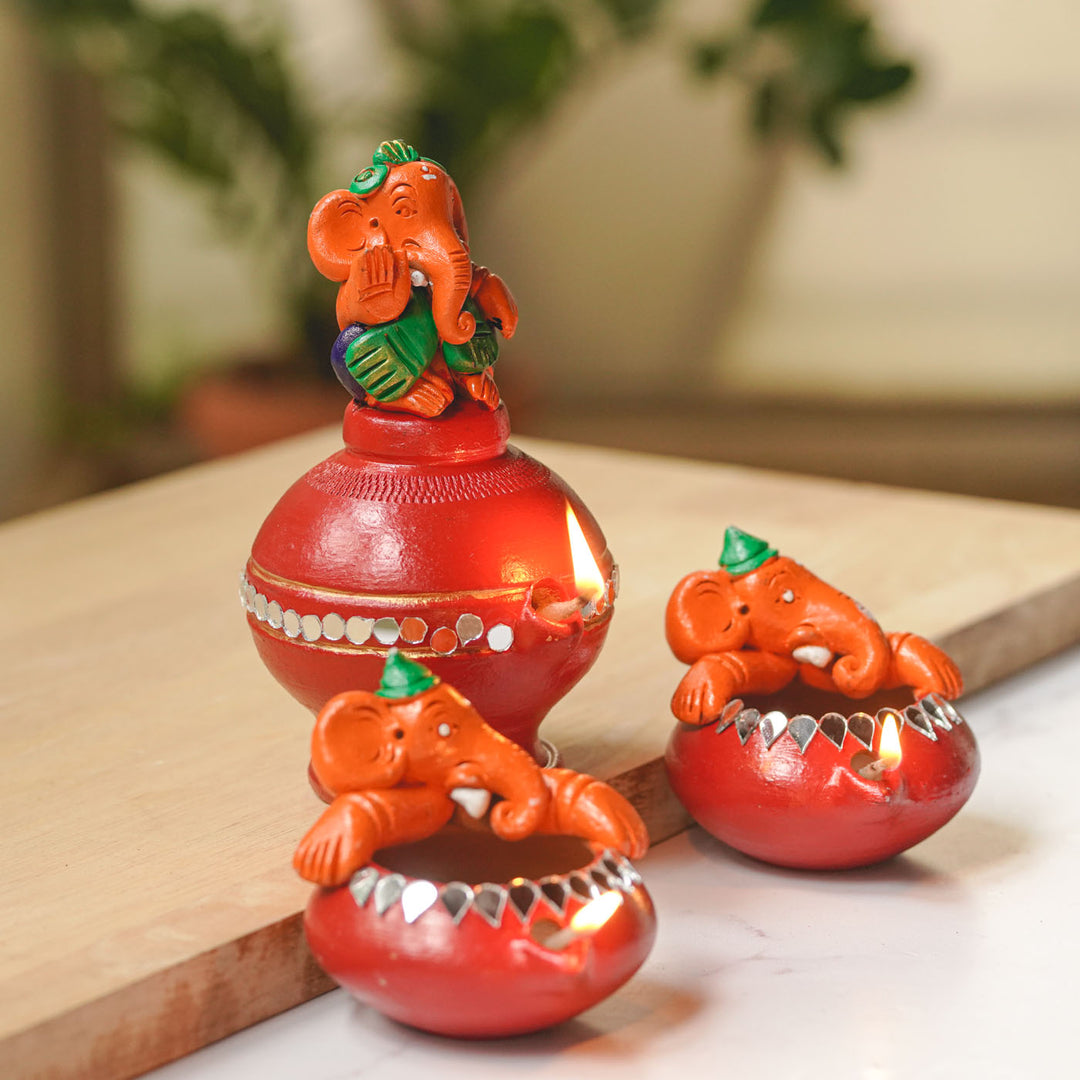 Handmade Painted Ganesh Design Terracotta Oil Lamp / Diya | Includes 1 Magic Diya And 2 Diyas
