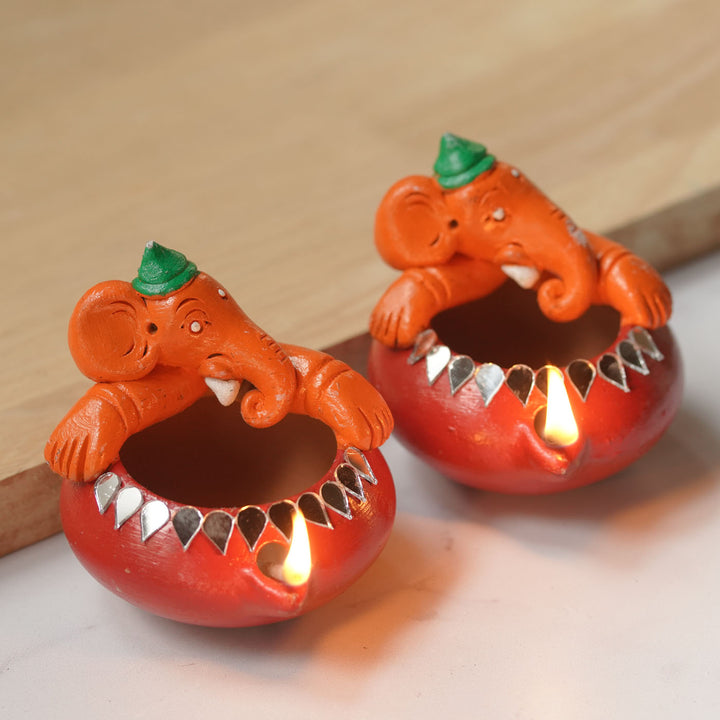 Handmade Painted Ganesh Design Terracotta Oil Lamp / Diya | Includes 1 Magic Diya And 2 Diyas