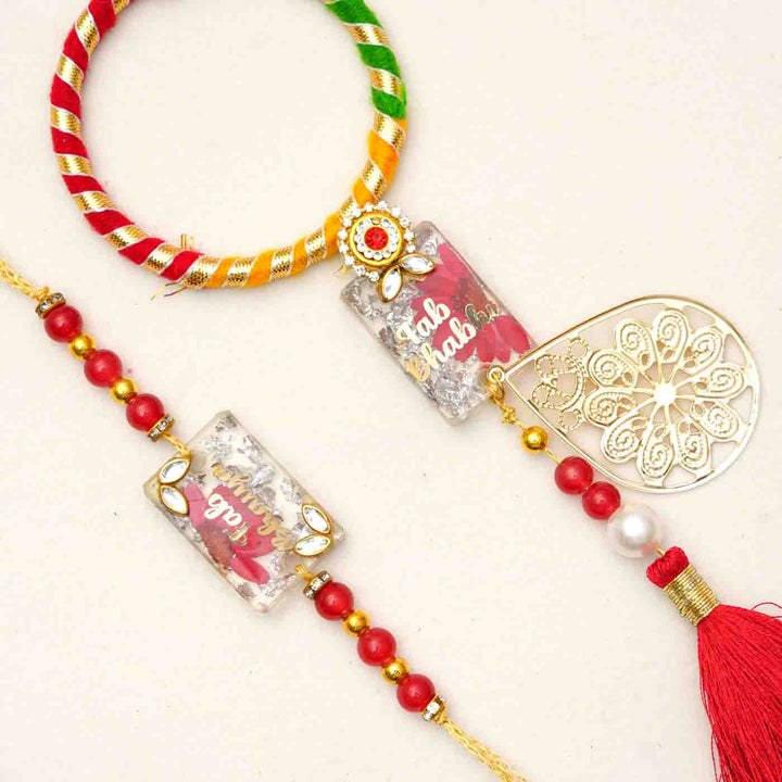 Handmade Resin Fab Bhaiya And Fab Bhabhi Rakhi With Chocolates And Roli Chawal Set Of 2 - Close-up of Rakhi details
