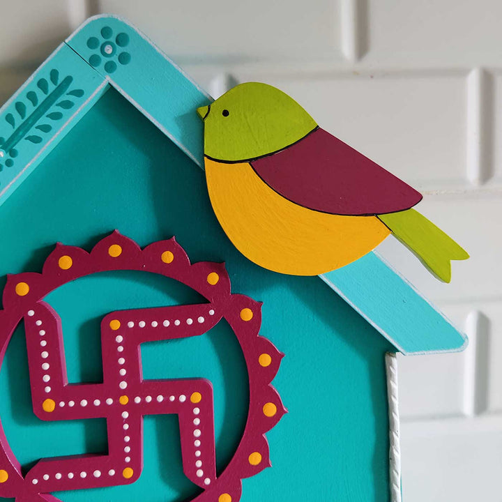 Handcrafted Personalized Swastik House Shaped Nameplate - Close-up of Top Corner Decoration