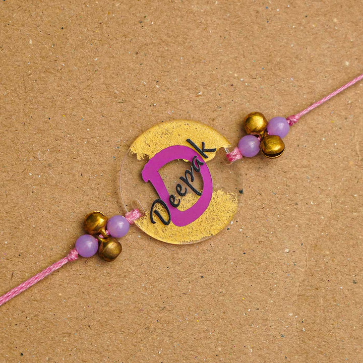 Personalized Handmade Name Golden Acrylic Rakhi With Roli Chawal