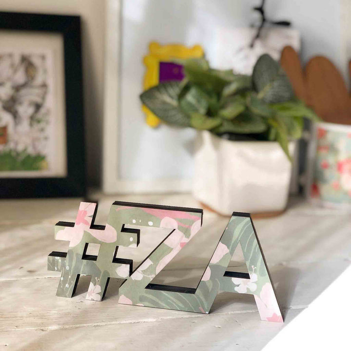 Printed Wooden Cutout Desk Name Plate - Front View on Flat Surface